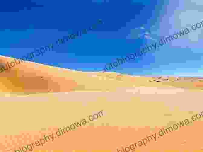 A Vast Desert Landscape With Towering Sand Dunes And A Clear Blue Sky Atlas Of The World S Deserts